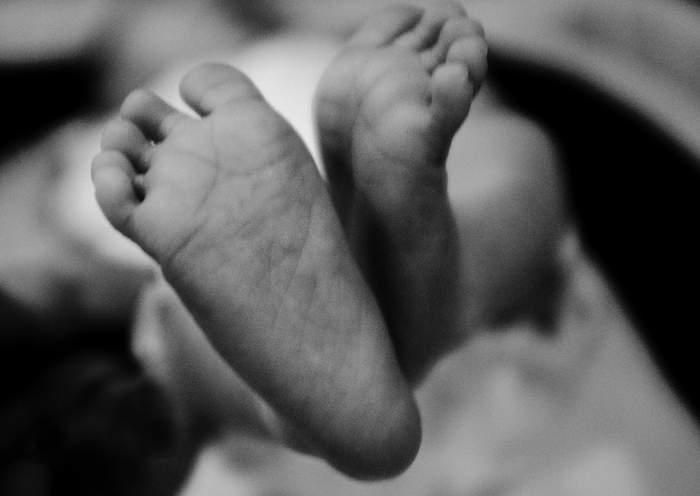 A close-up of a newborn’s feet.