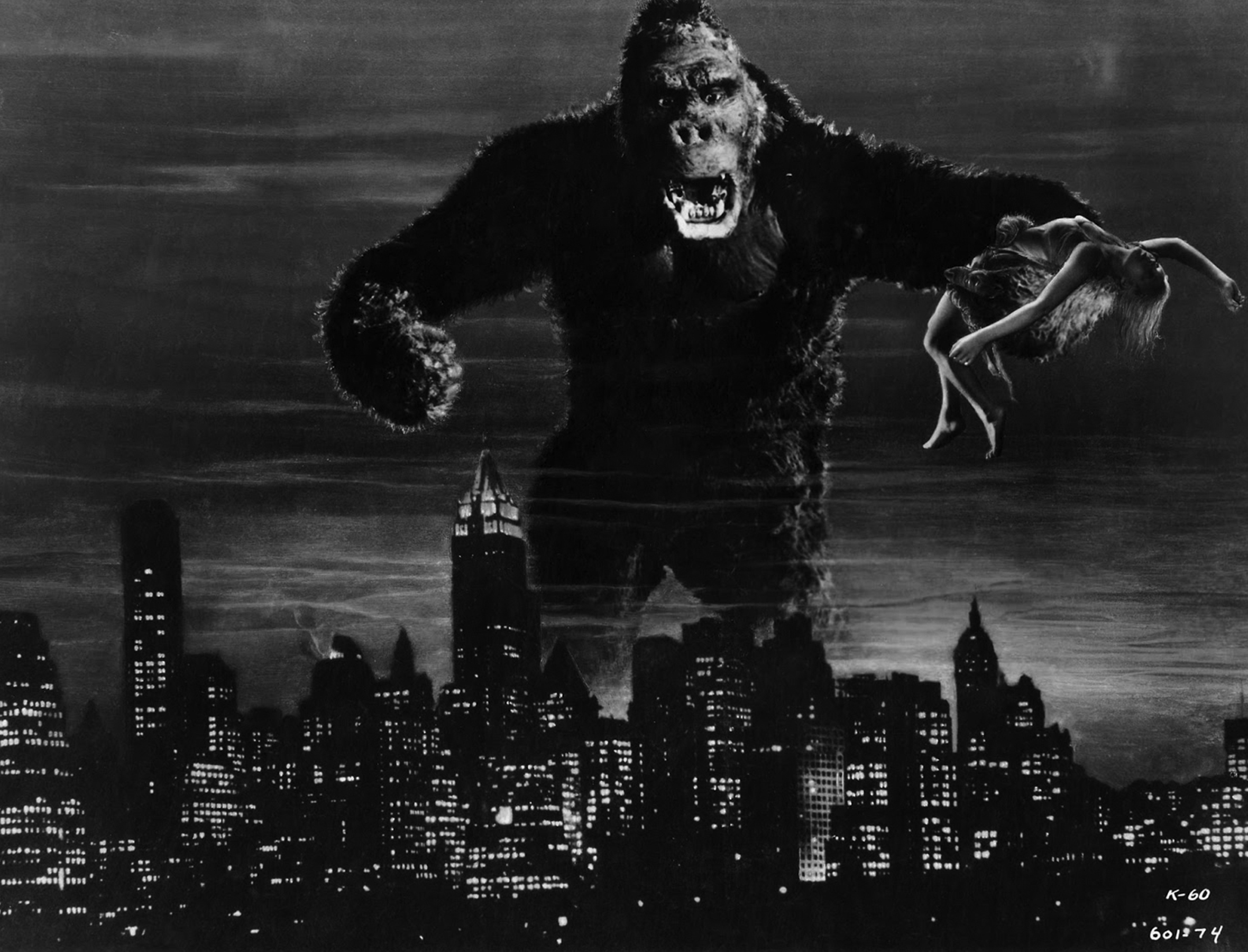 Publicity still from the 1933 RKO Radio Pictures film King Kong. King Kong is towering over the New York City skyline with Ann Darrow in his grasp.