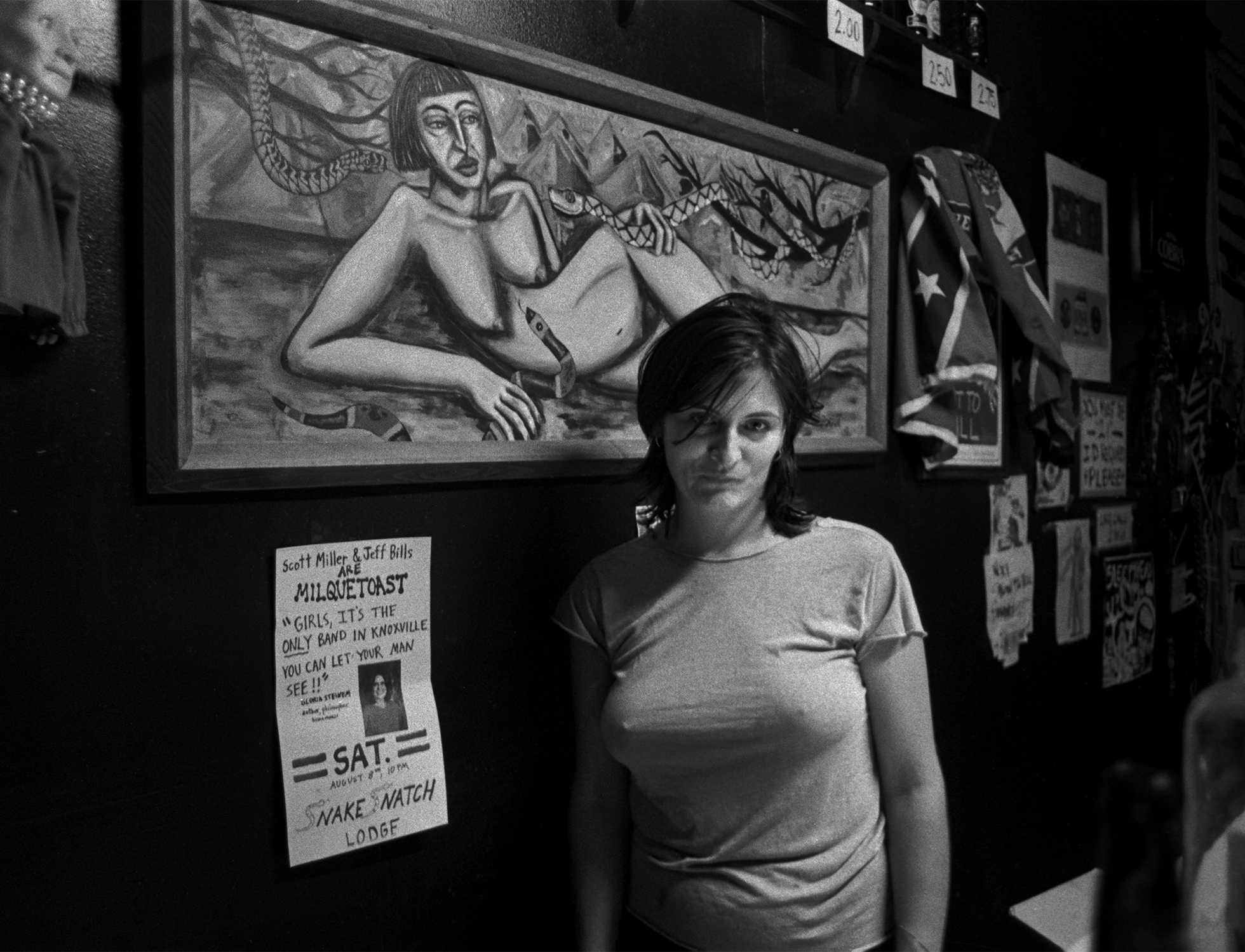 Jackie Arthur behind the bar at the Snake Snatch Lodge in Knoxville, Tennessee. After the show she would help the bands find a place to sleep.