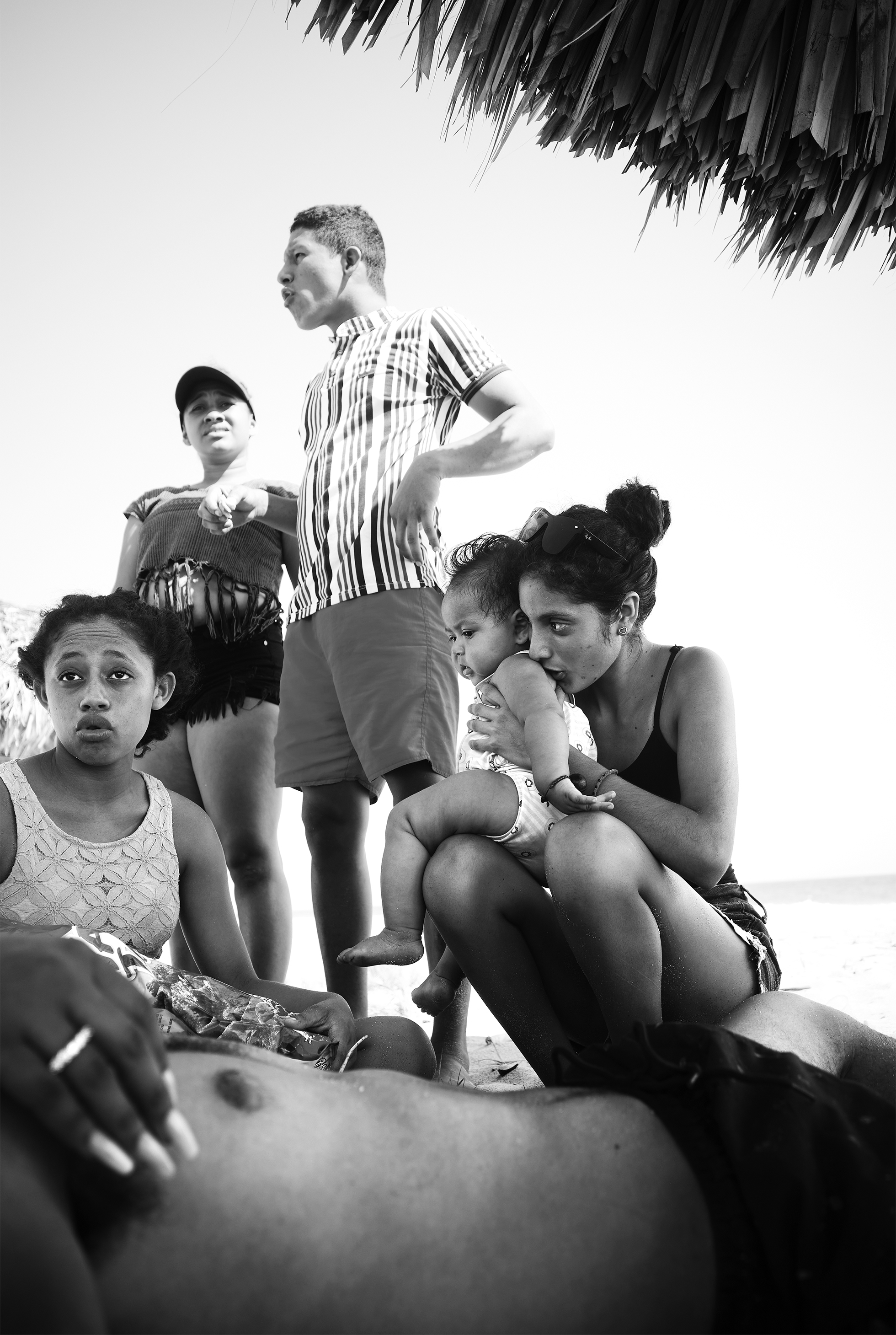 A family spends Sunday at the beach near Paso de la Garrocha, Oaxaca.